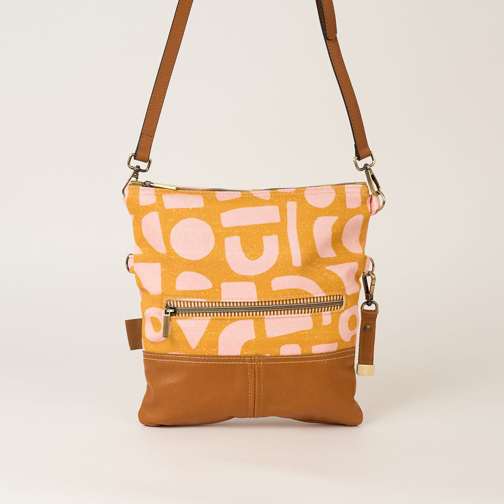 Blush shapes fold over bag