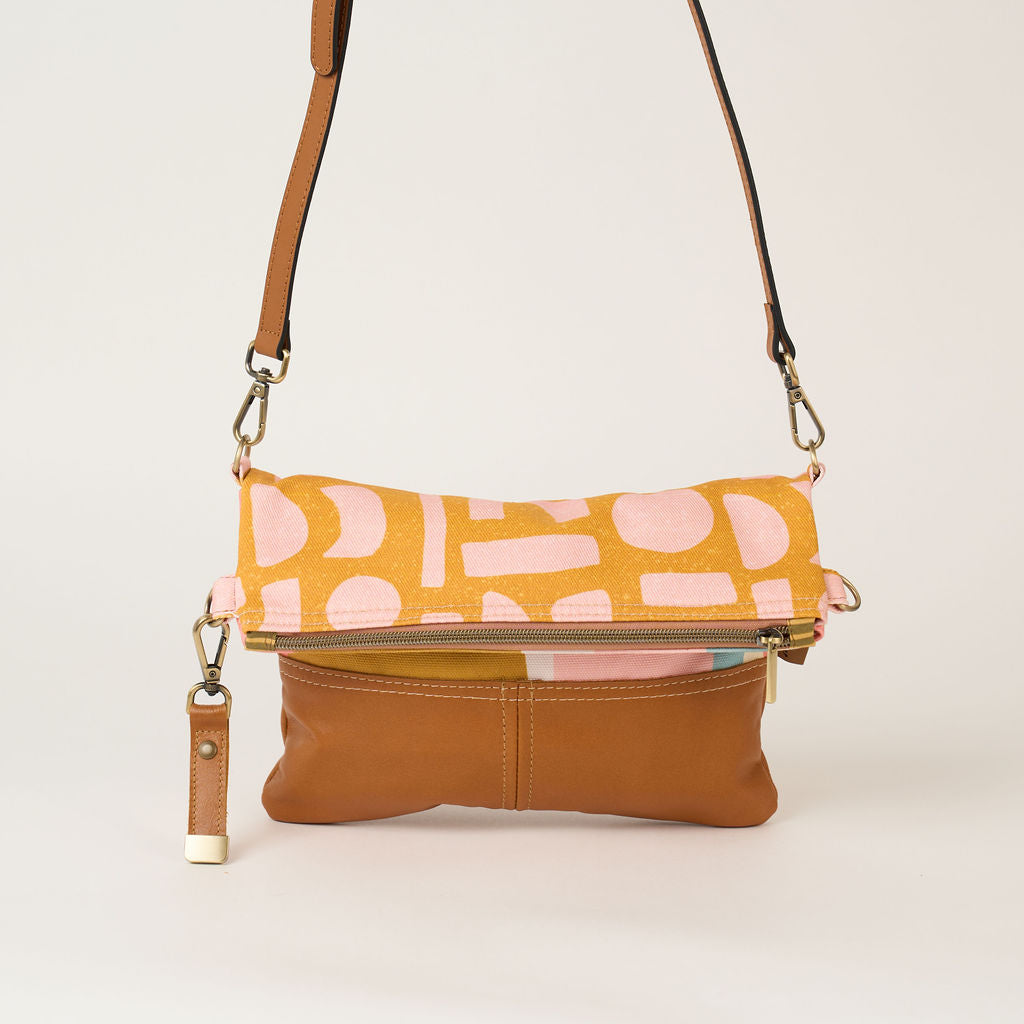 Blush shapes fold over bag