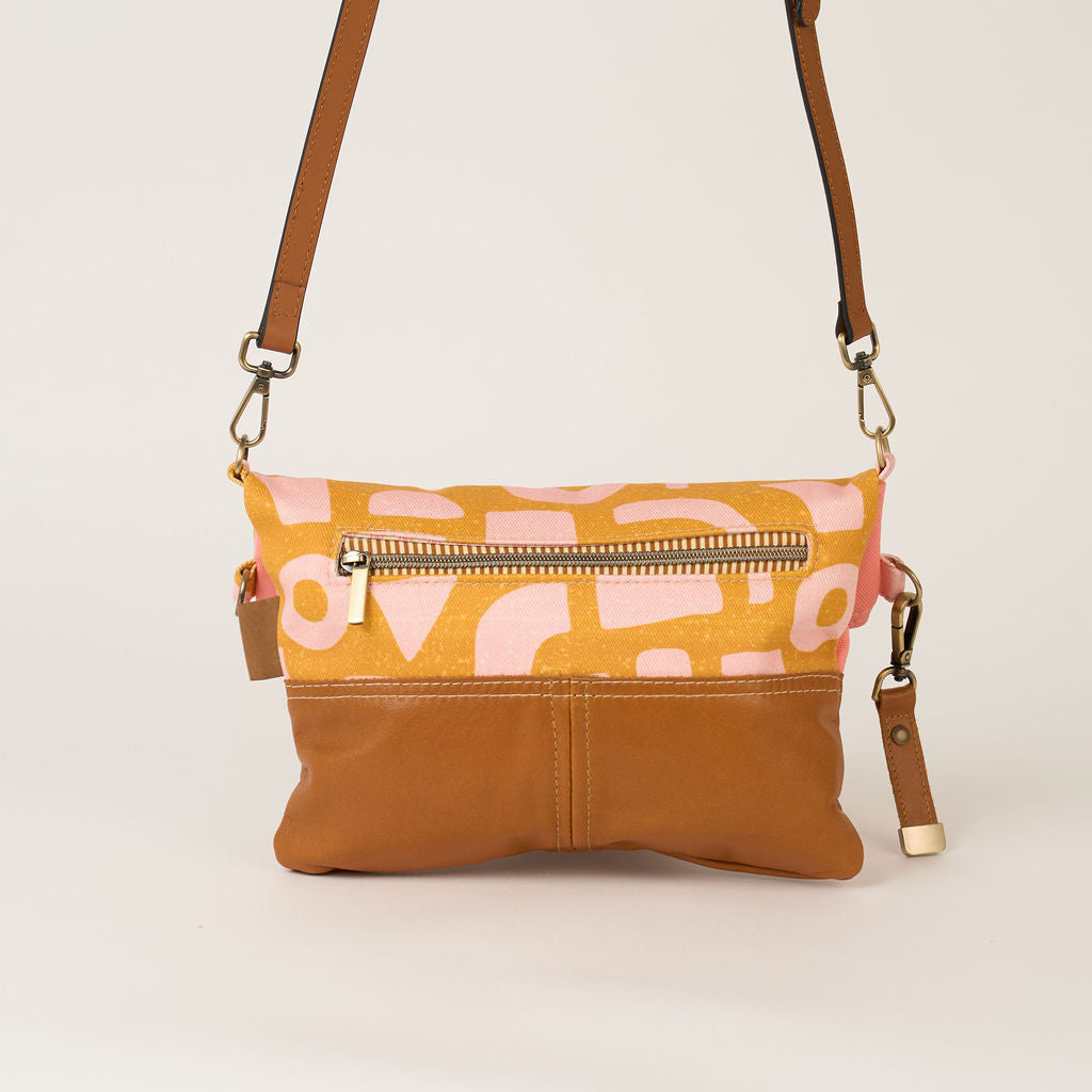 Blush shapes fold over bag