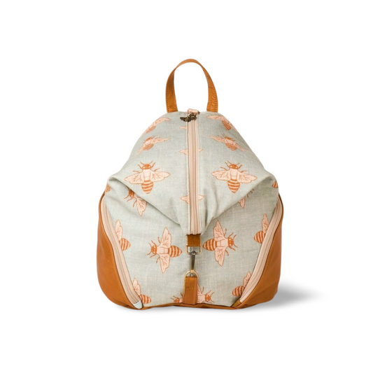 backpack front in bee printed canvas with leather trim