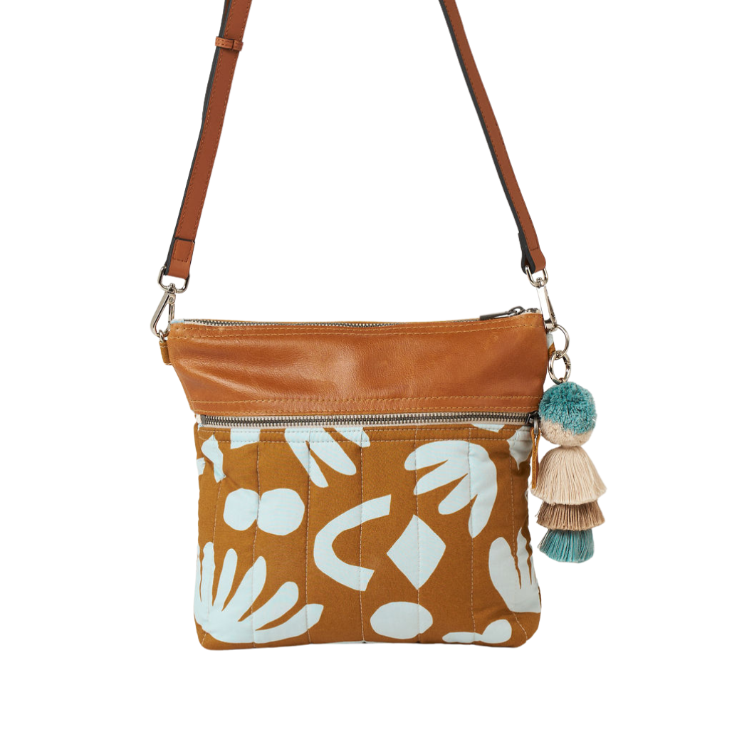 Blue and tan fabric and leather crossbody bag