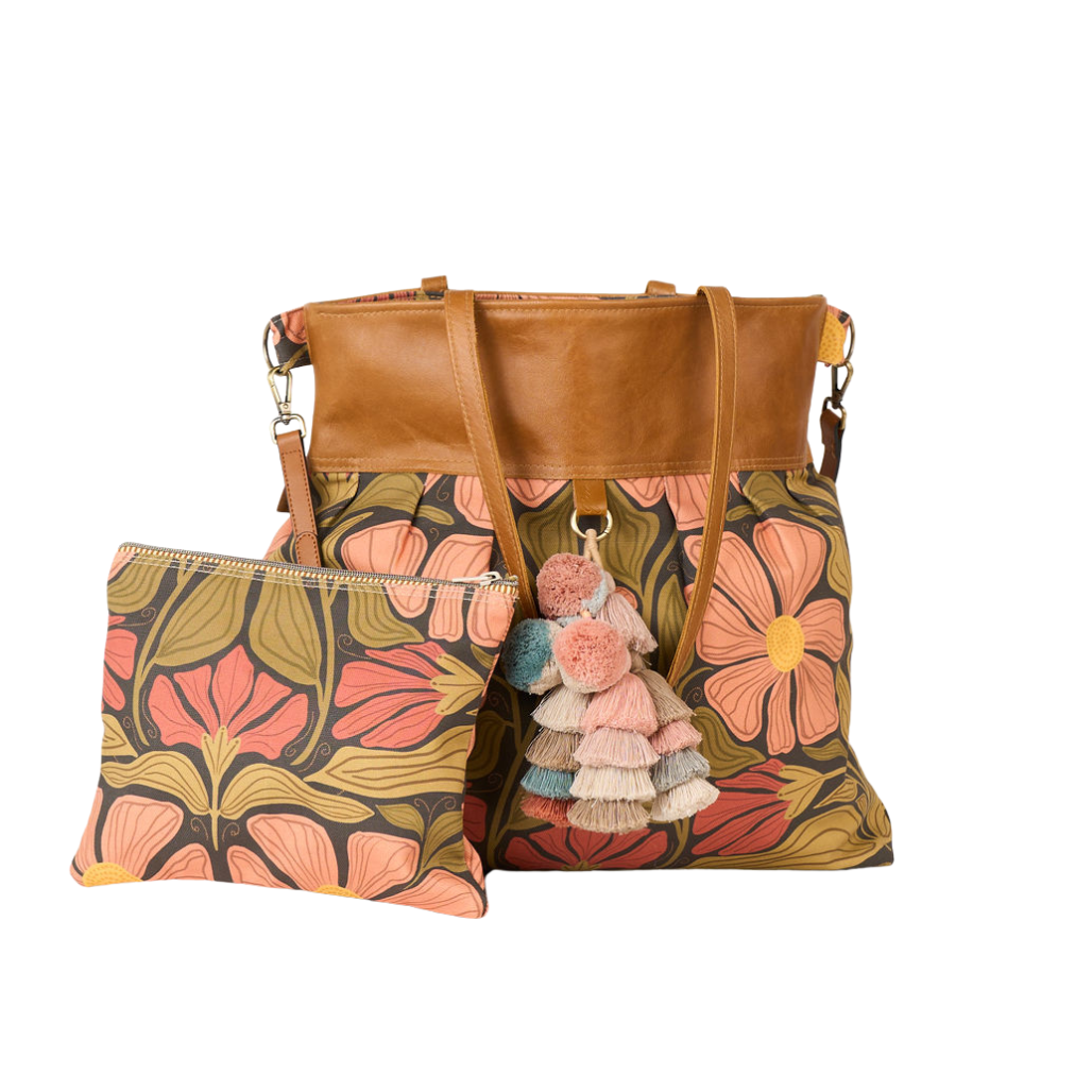 large overnight floral bag and a clutch to match