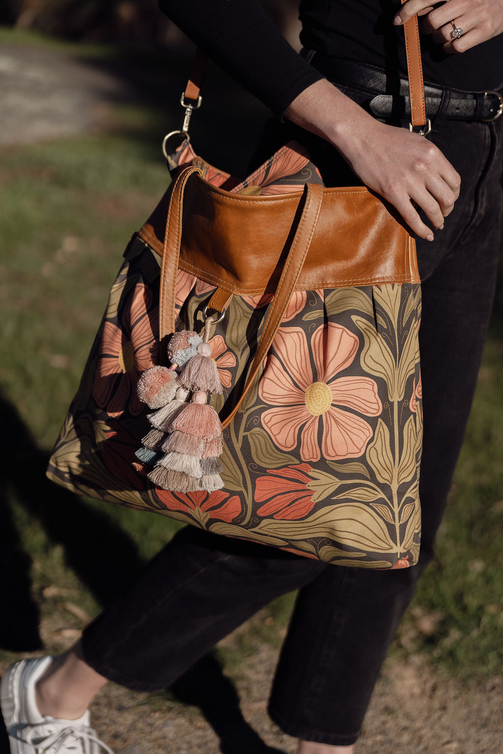 girl holding the large weekender overnight bag