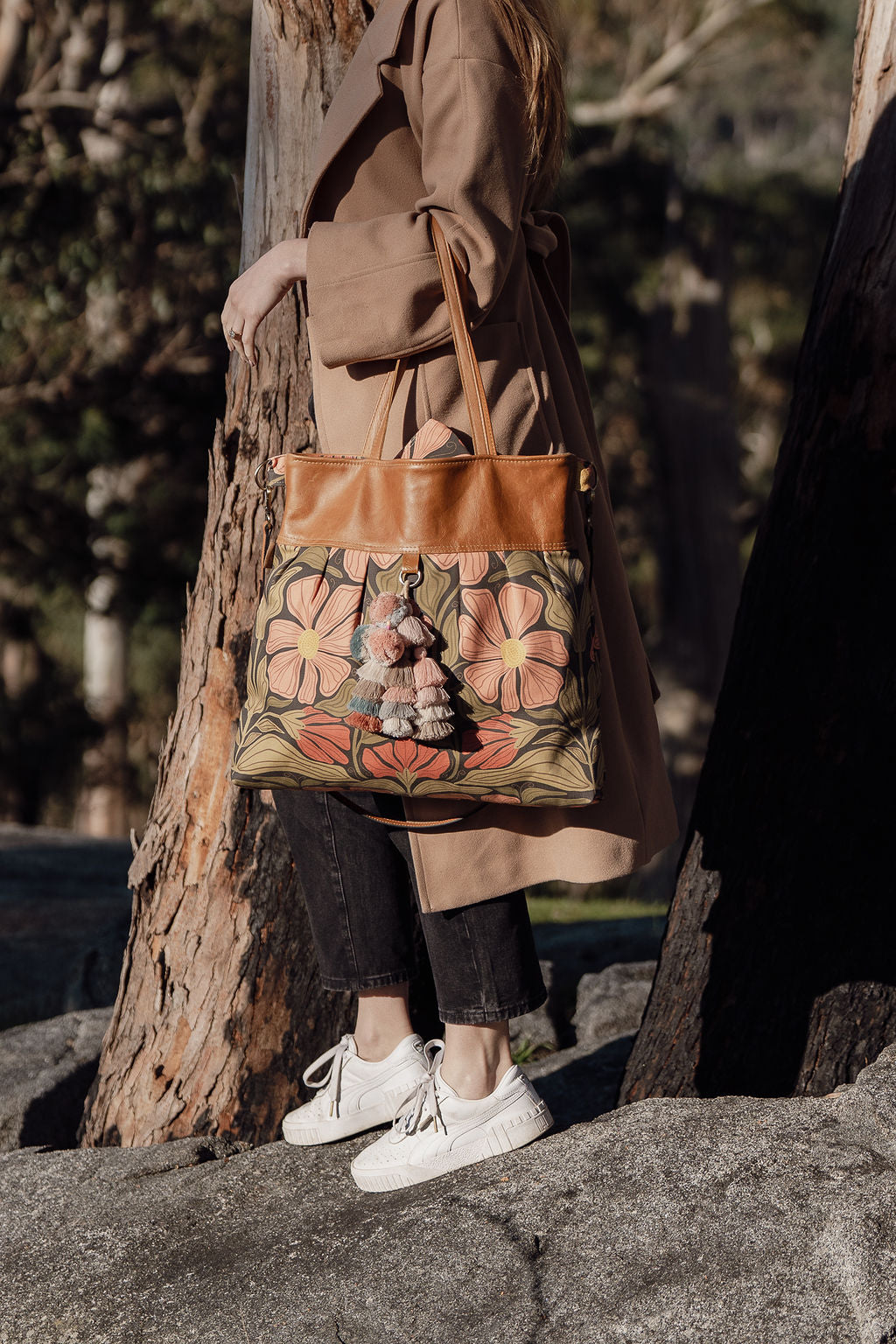 girl holding the large weekender overnight bag