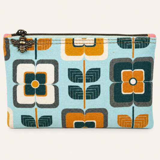 Fabric pouch with floral pattern on a white background made by madbagss