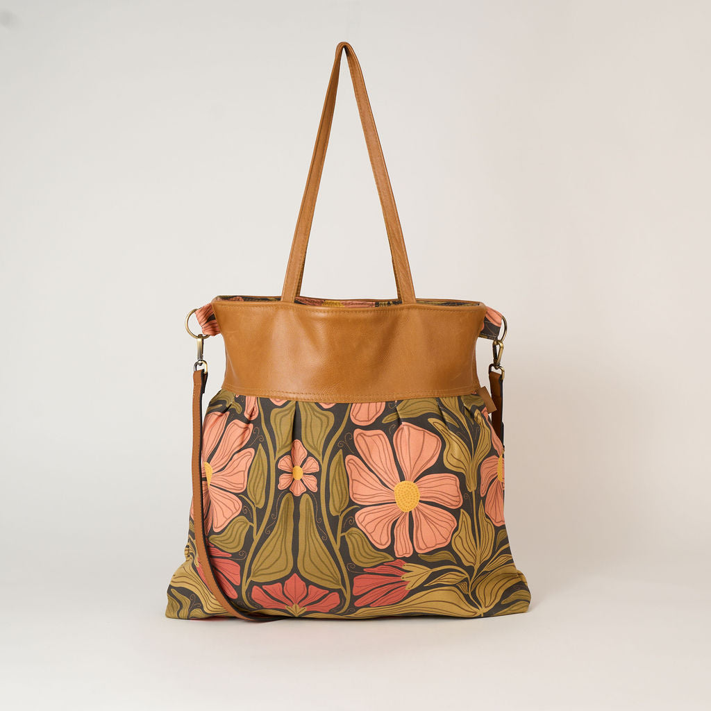 large overnight floral bag and a clutch to match