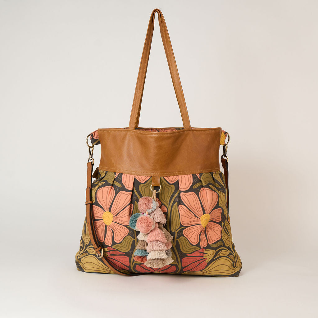 large overnight floral bag and a clutch to match