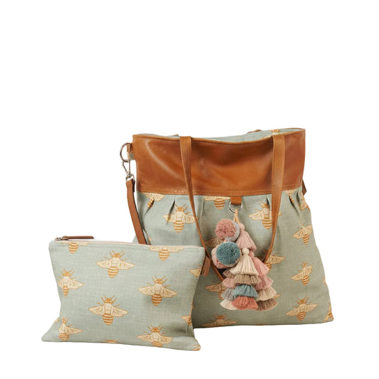 A large bag with a printed bee design 